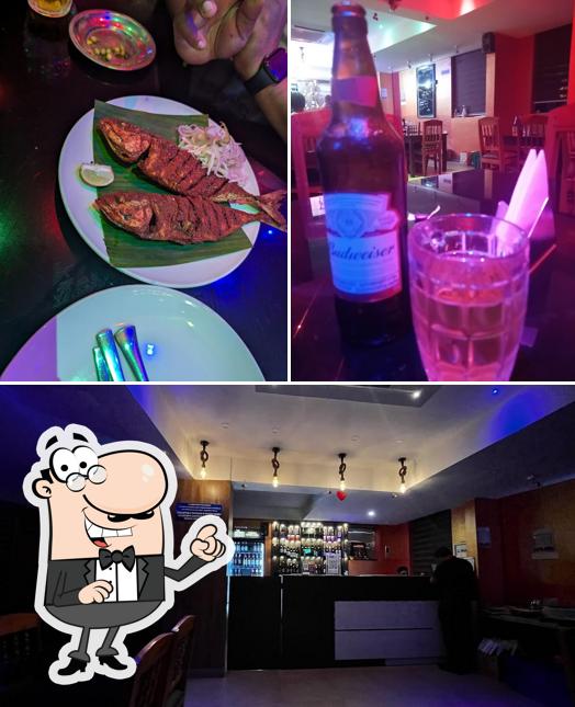 Take a seat at one of the tables at BEER & WINE PARLOUR