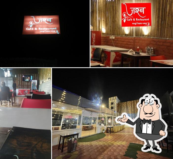 Take a seat at one of the tables at Jashn, The Cafe and Restaurant