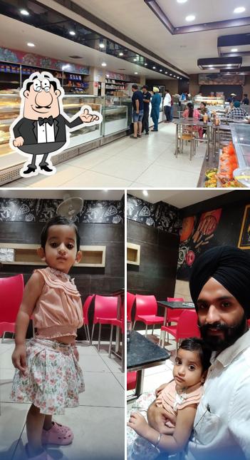Take a seat at one of the tables at Big Ben Mithai