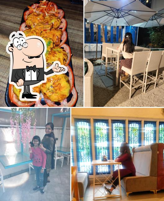 Take a seat at one of the tables at THE MAD CAFE