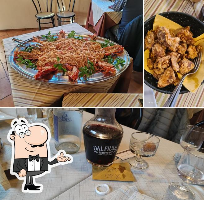 Dai un’occhiata alla immagine che presenta la interni e cibo di Il Mestolo