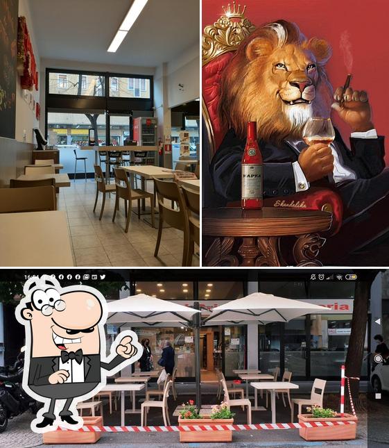 Pizzeria Grand Prix si caratterizza per la interni e birra