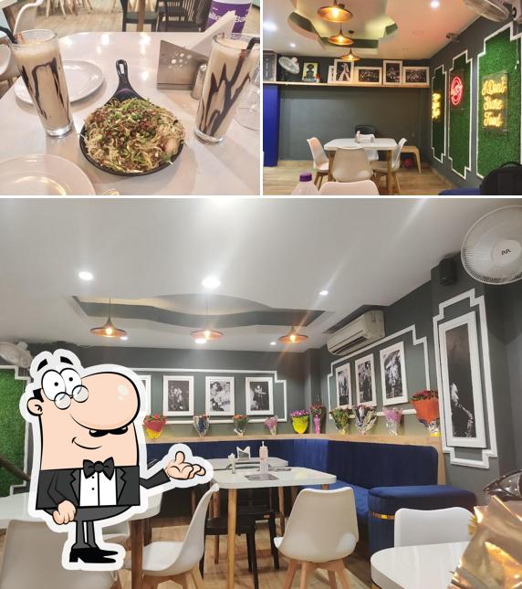 The photo of UTC Uptown Cookhouse’s interior and dining table