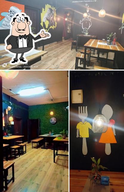 Take a seat at one of the tables at Laffah Hub Restaurant