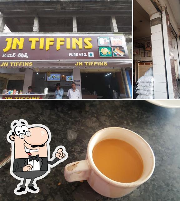Take a look at the image showing exterior and beverage at JN TIFFINS