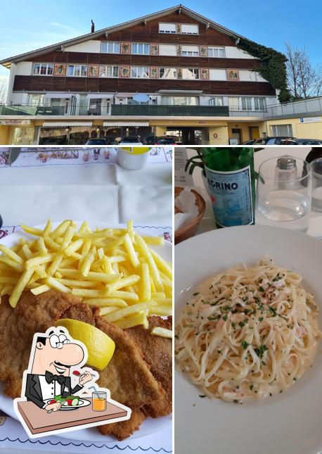 La immagine della cibo e esterno di Restaurant Rebstock