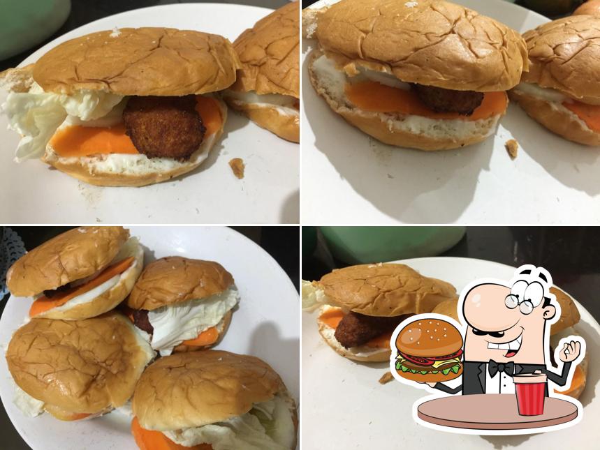 Order a burger at Thasaj Restaurant
