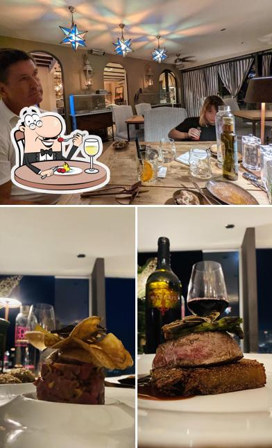 Questa è la immagine che mostra la cibo e tavolo da pranzo di Incanto