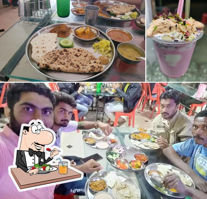 Check out the image displaying food and beverage at Madhav Hotel