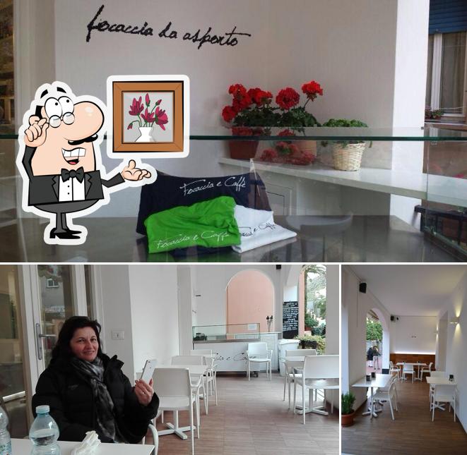 La foto della interni e tavolo da pranzo di Focaccia e Caffè
