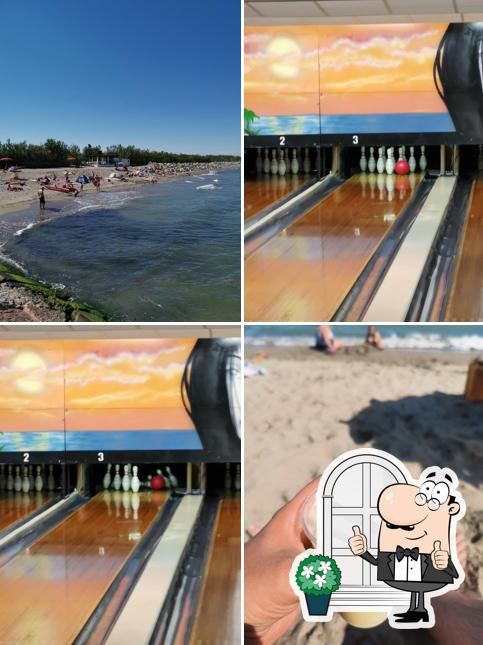 Puoi goderti l'aria fresca da seduto all'esterno di Bar della spiaggia Rosa e pineta