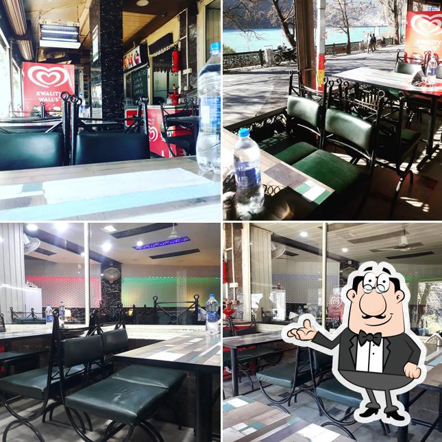 Take a seat at one of the tables at Cafe de Mall