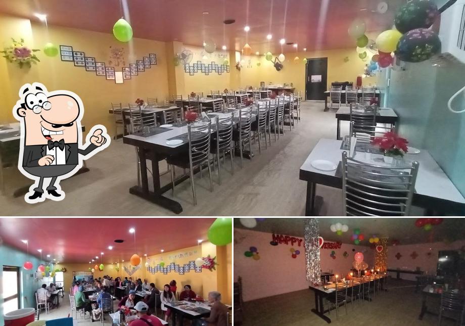 Take a seat at one of the tables at THE RANGE RESTAURANT