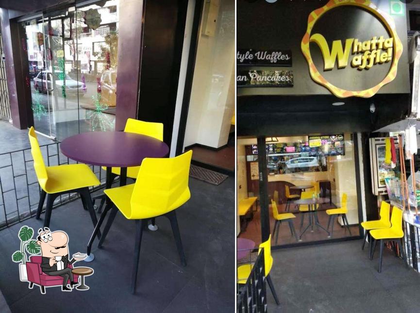 Take a seat at one of the tables at Whatta Waffle!