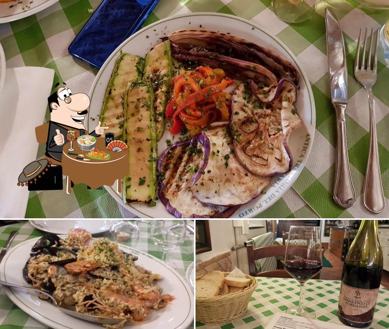 Antica Trattoria Maria Del Porto si caratterizza per la cibo e interni