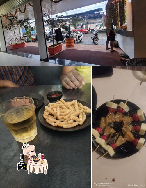 Take a look at the photo depicting food and exterior at HOTEL PRIT BAR & FAMILY RESTAURANT