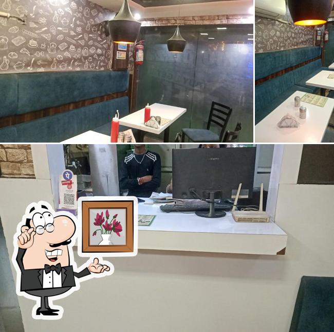 Take a seat at one of the tables at Sfizio pizza