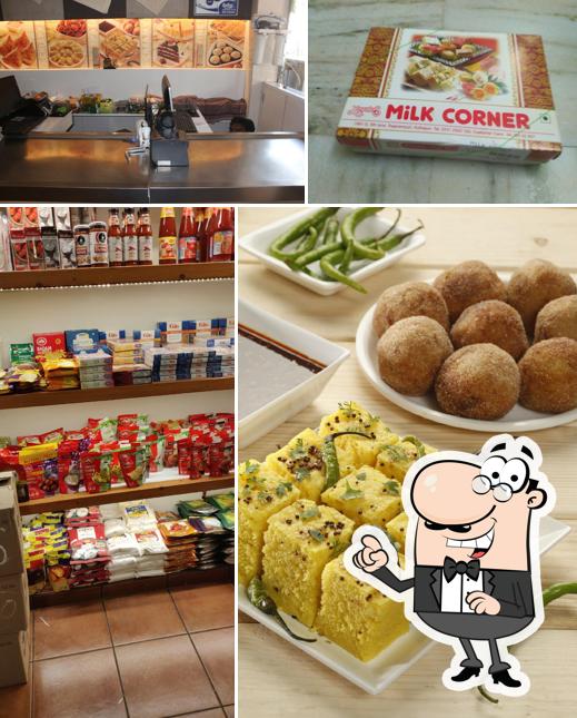 Take a seat at one of the tables at Yevale's Milk Corner (Sweet Dairy Namkeen Cake Bakery Mithai Shop)