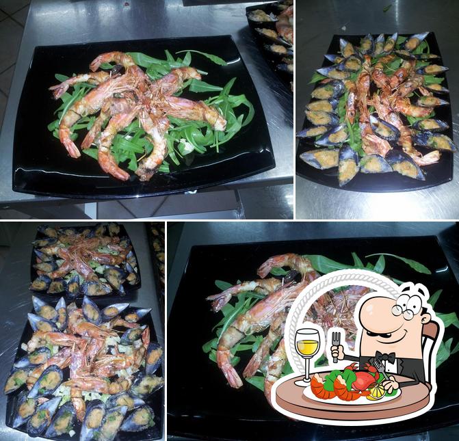 Prenditi la cucina di mare a Pizzeria marconi