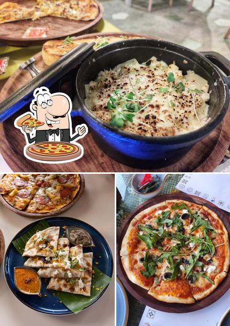 Try out pizza at POACH - Kitchen Espresso