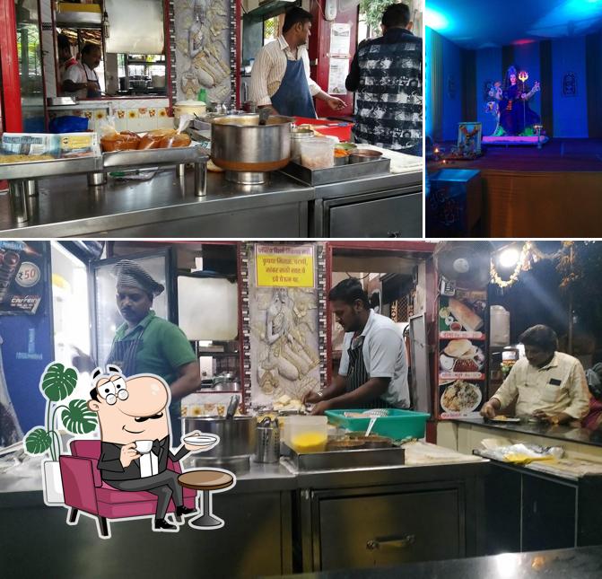 The interior of Shree Ganesh Vadapav & Cool Drinks Center