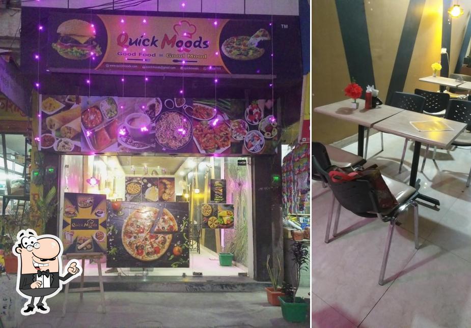 Take a seat at one of the tables at Quick Moods