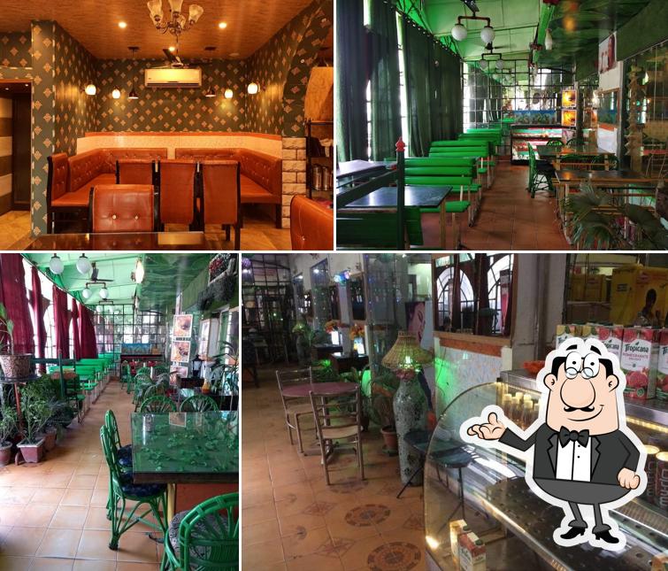 Take a seat at one of the tables at Koyal Grand