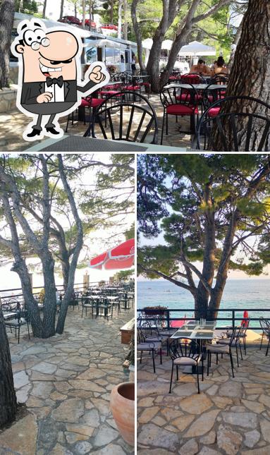 Dai un'occhiata agli interni di Restoran Orange