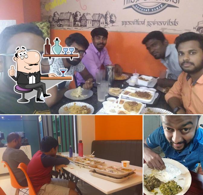 Take a seat at one of the tables at Kolapasi Indian Canteen - Anna Nagar, Chennai