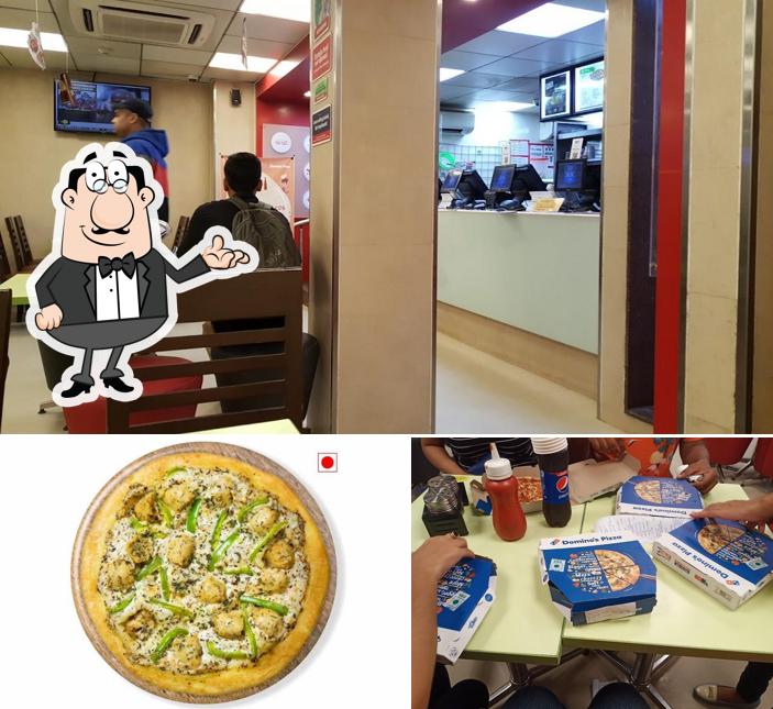 Domino's Pizza Six Mile, Guwahati is distinguished by interior and cake