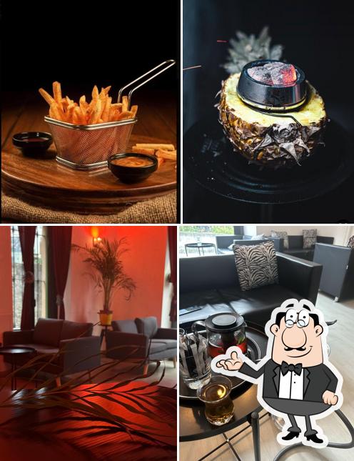 Questa è la foto che mostra la interni e cibo di Momo Shisha Bar - مومو مقهى أركيلة