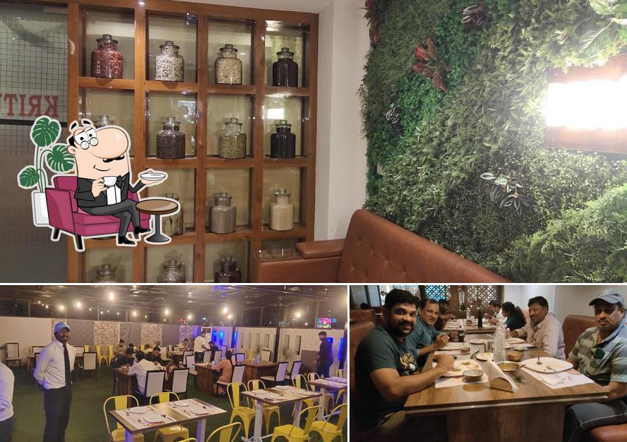 Take a seat at one of the tables at Kritunga Restaurant