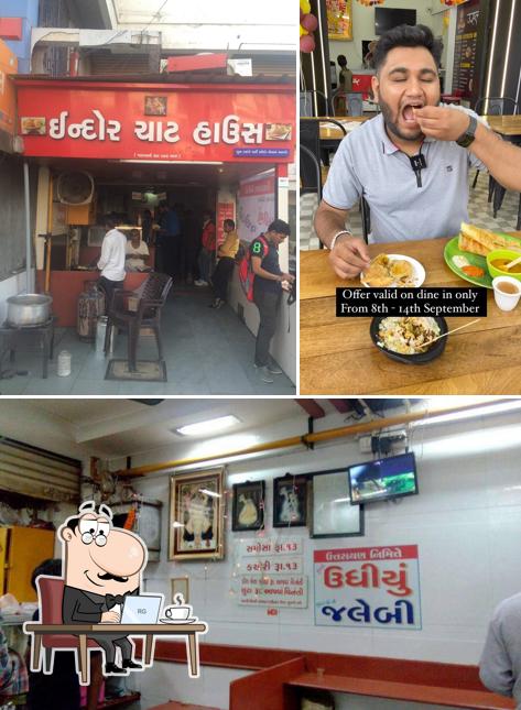 Take a seat at one of the tables at Indore Chaat House