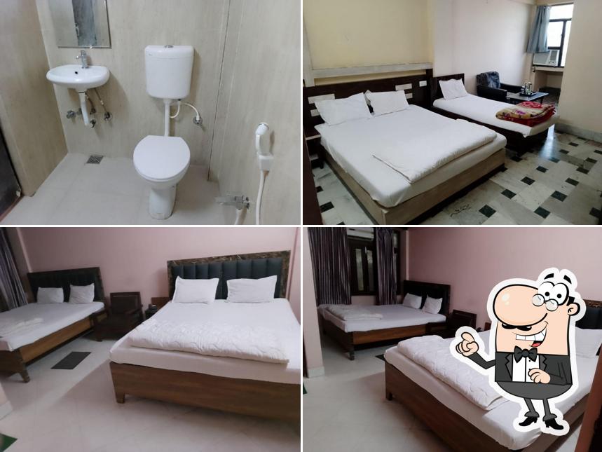 Take a seat at one of the tables at Ajatsatru Hotel