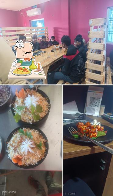 Take a look at the photo showing food and interior at Hunger & Pain relief