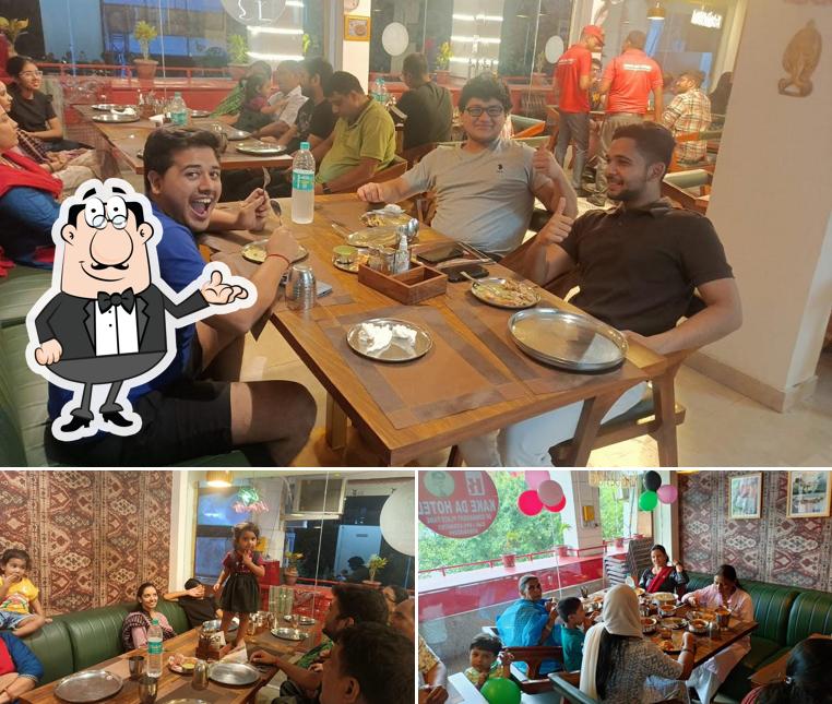 Take a seat at one of the tables at Kake Da Hotel Dwarka