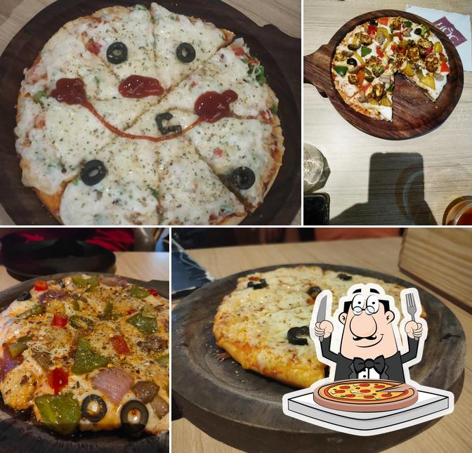 Try out pizza at House Of Cakes