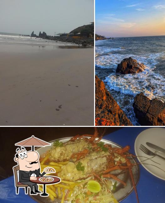 Check out the photo displaying exterior and food at meston beach shack