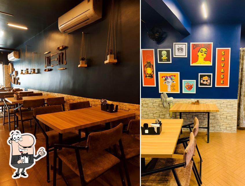 Take a seat at one of the tables at Delhi Grill