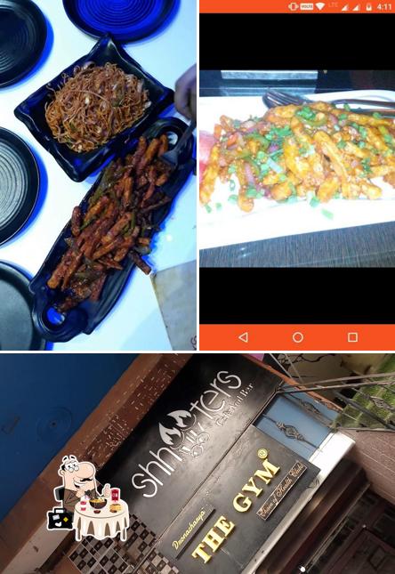 Take a look at the picture depicting food and interior at Shooters Bar