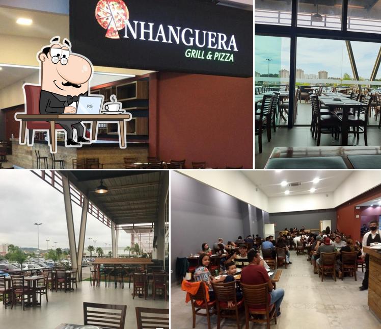 O interior do Anhanguera Grill & Pizza