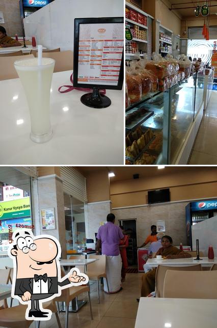 Take a look at the photo depicting interior and food at Navya Bakers, T B junction