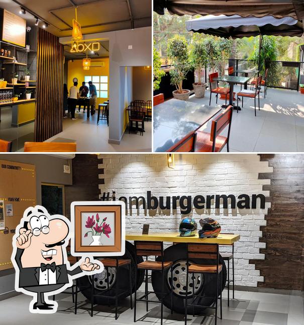 Take a seat at one of the tables at BurgerMan