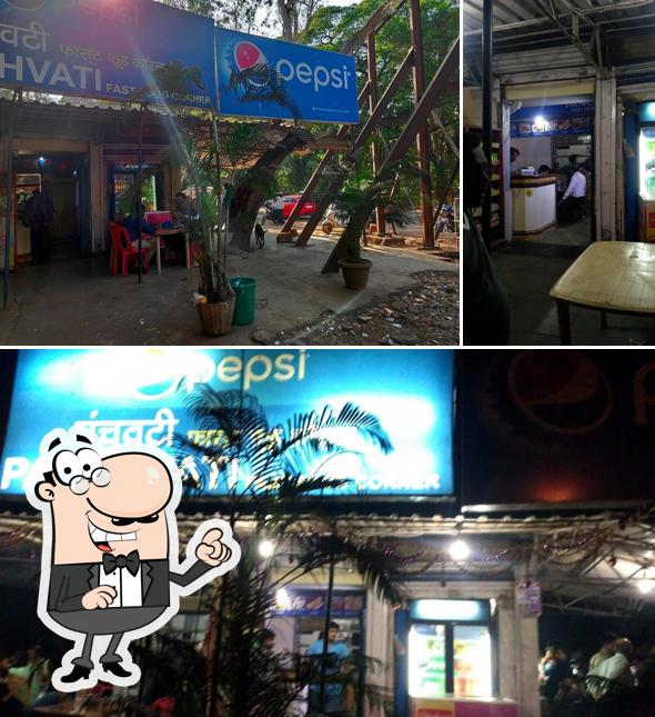 Take a seat at one of the tables at Panchvati Fast Food Restaurant