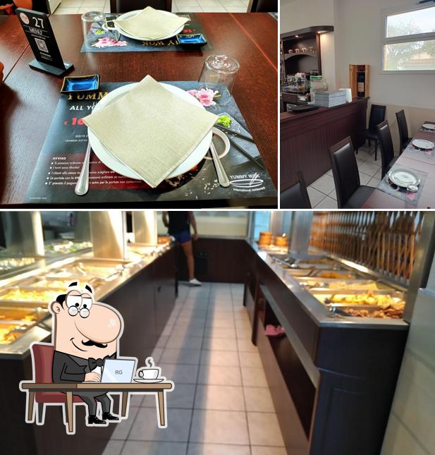 Dai un'occhiata agli interni di Yummy Wok