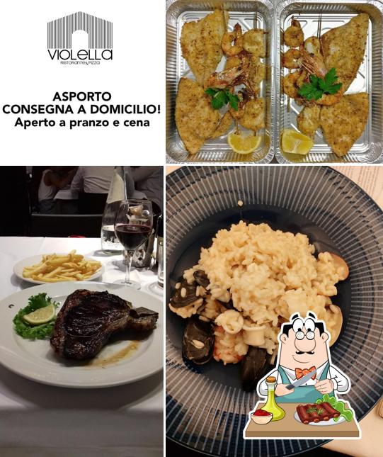 Piatti di carne vengono serviti a Violella
