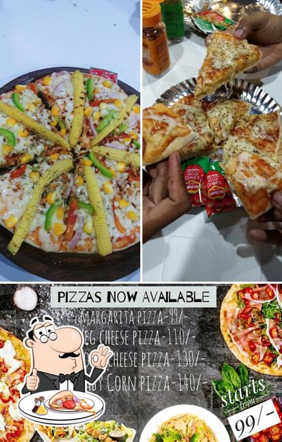 Get pizza at Taste Buds