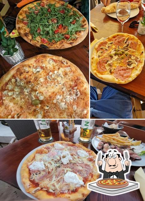 Ordina una pizza a Momento Grill Pizza House