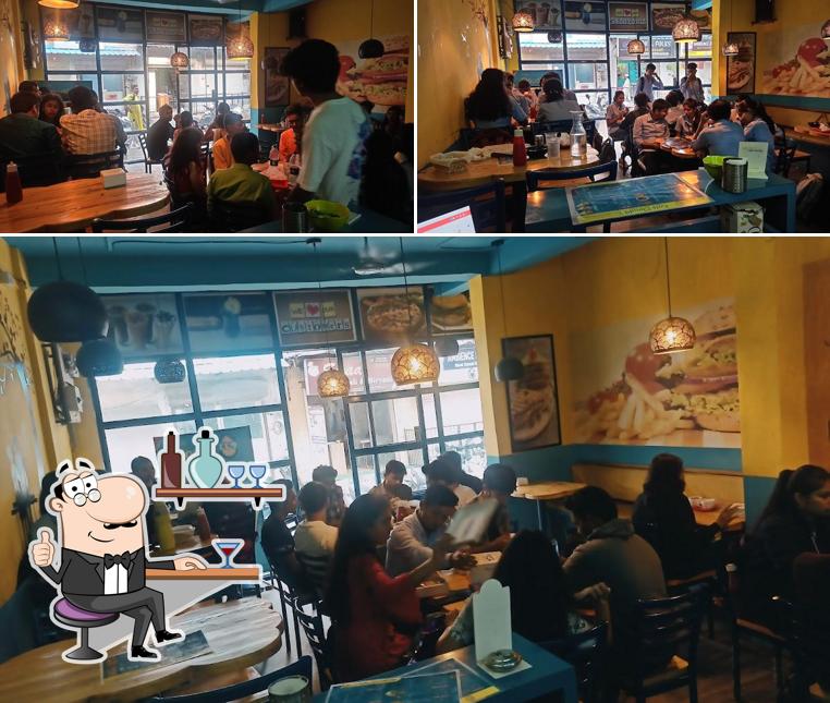 Take a seat at one of the tables at Cafe Cloud 9