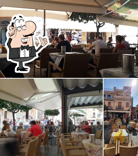 Dai un'occhiata agli interni di Amigos Bar